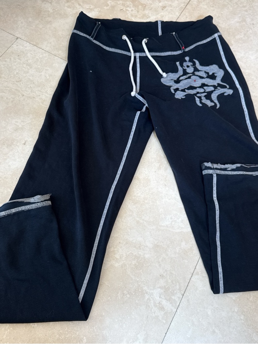 Black Sweatpants with Contrast Stitching and Graphic Detail